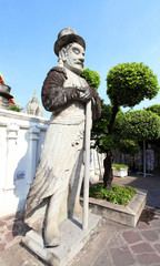 Statue of Man at Wat Pho in Bangkok, Thailand