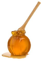 jar of honey isolated on white