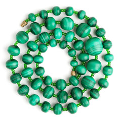Beads made of malachite, rolled in a spiral