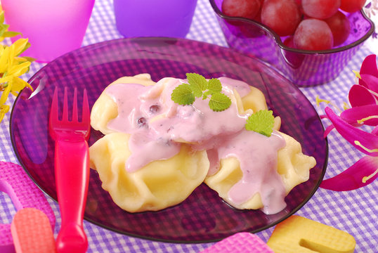 sweet ravioli with blueberry yogurt