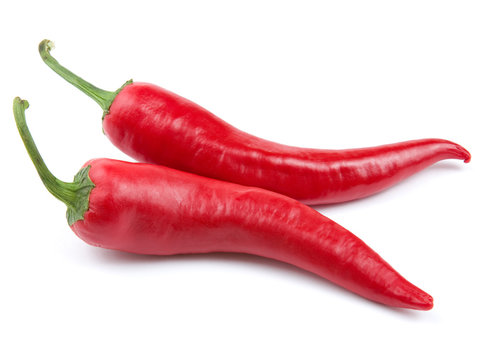 two red hot chili pepper isolated on a white background