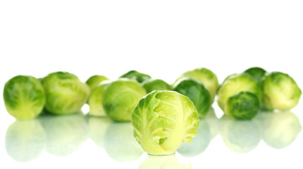 Fresh brussels sprouts isolated on white