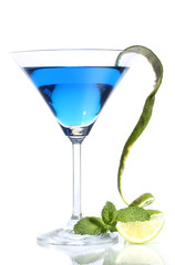 Blue cocktail in martini glass isolated on white