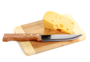 Cheese on cutting board with knife isolated on white