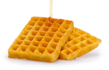 belgium waffles with honey isolated on white
