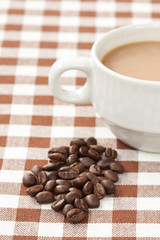 A cup of coffee and bean