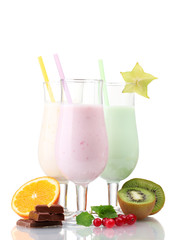 Milk shakes with fruits isolated on white