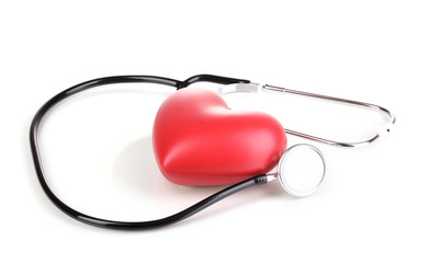 Medical stethoscope and heart isolated on white