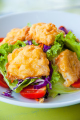 Delicious salad with fish, vegetable and dipping sauce