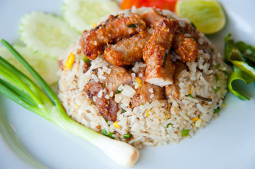 delicious fried rice with deep fried pork and vegetable