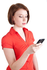 Fototapeta premium Junge Frau schreibt Sms