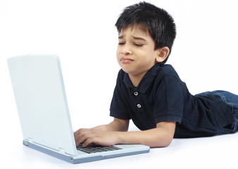 Indian boy using a laptop