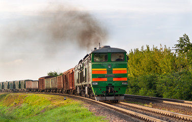 Freight train hauled by diesel locomotive. Belarusian railway