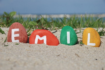 Emil, male name on colourful pebbles