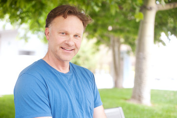 Fototapeta premium portrait of a man in a park