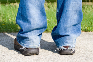 Special Sneakers for walking and ripped jeans.