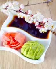 Pickled ginger with soy sauce and wasabi for sushi