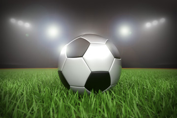 Naklejka premium Fussball im Stadion Flutlicht Nachts