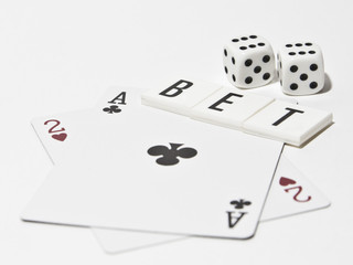 bet text with cards and dice
