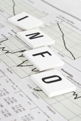 info text written over stock market paper