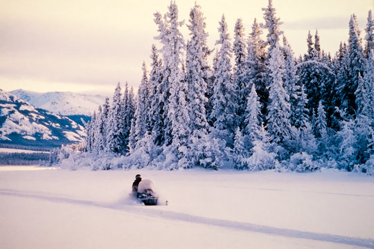 Winter snow sports on a snowmobile