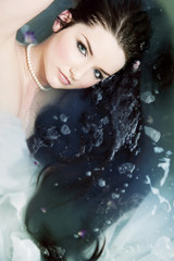 Woman relaxing in water