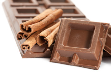 chocolate bar with cinnamon, on white background