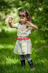 Little girl in a meadow.