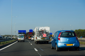 Fototapeta na wymiar File traffic at highway