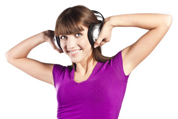 Naklejka premium Pretty young woman listening music