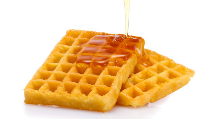 belgium waffles with honey isolated on white