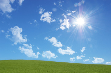 Collinetta con nuvole e sole