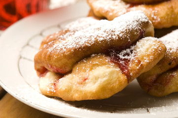 Sweet doughnuts with rose marmelade