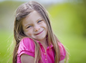 Adorable little girl outdoor portrait