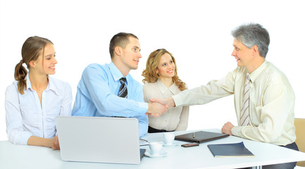 Beautiful businesswoman keeps the laptop.