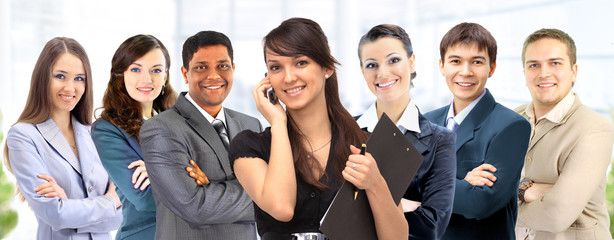 Office an interracial team of seven people.