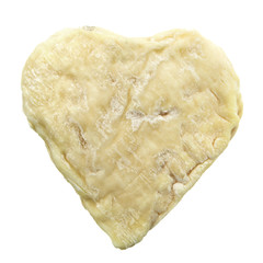 Heart shape moldy goat cheese isolated on white background