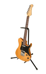 yellow electric guitar on a stand