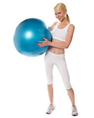 Fototapeta premium Healthy fit female athlete with a ball