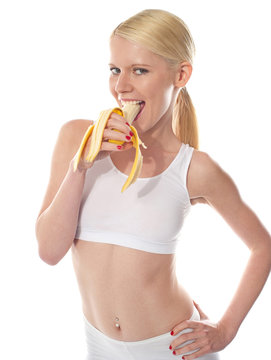 Wanna some? A starving sexy woman eating banana