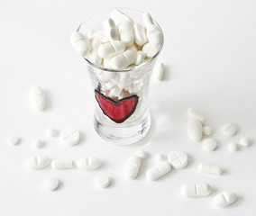shot glass with pills