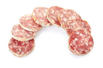 Salami slices on white, clipping path included