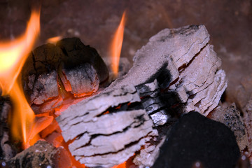 peat briquettes burning white hot