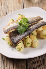 Pan fried trout fillets with potatoes