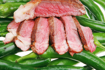 meaty food : grilled meat steak sliced hot chili peppers