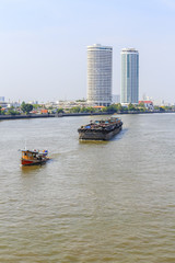 Fototapeta premium General cargo ship at Chao Phraya River. Bangkok, Thailand.