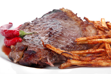 meat steak on white round plate