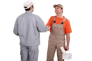 Painters shaking hands