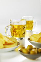 beer appetizer with olives and chips