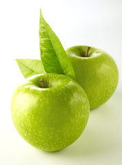 two green apple fruits isolated on white background